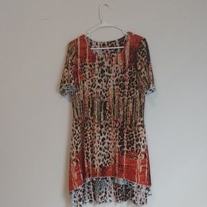 Reversible angled, short sleeve dress.